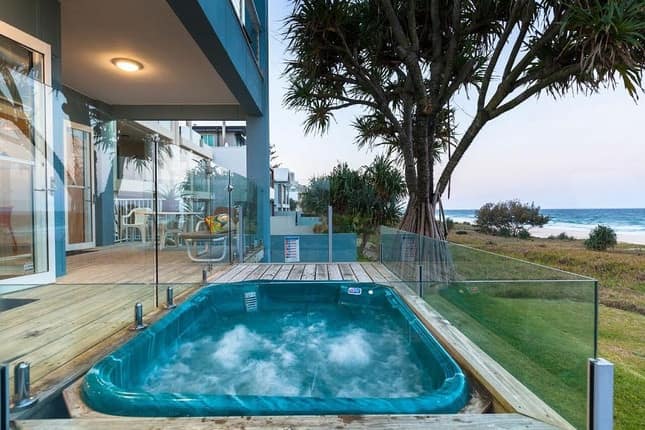 Beach house with a hot tub