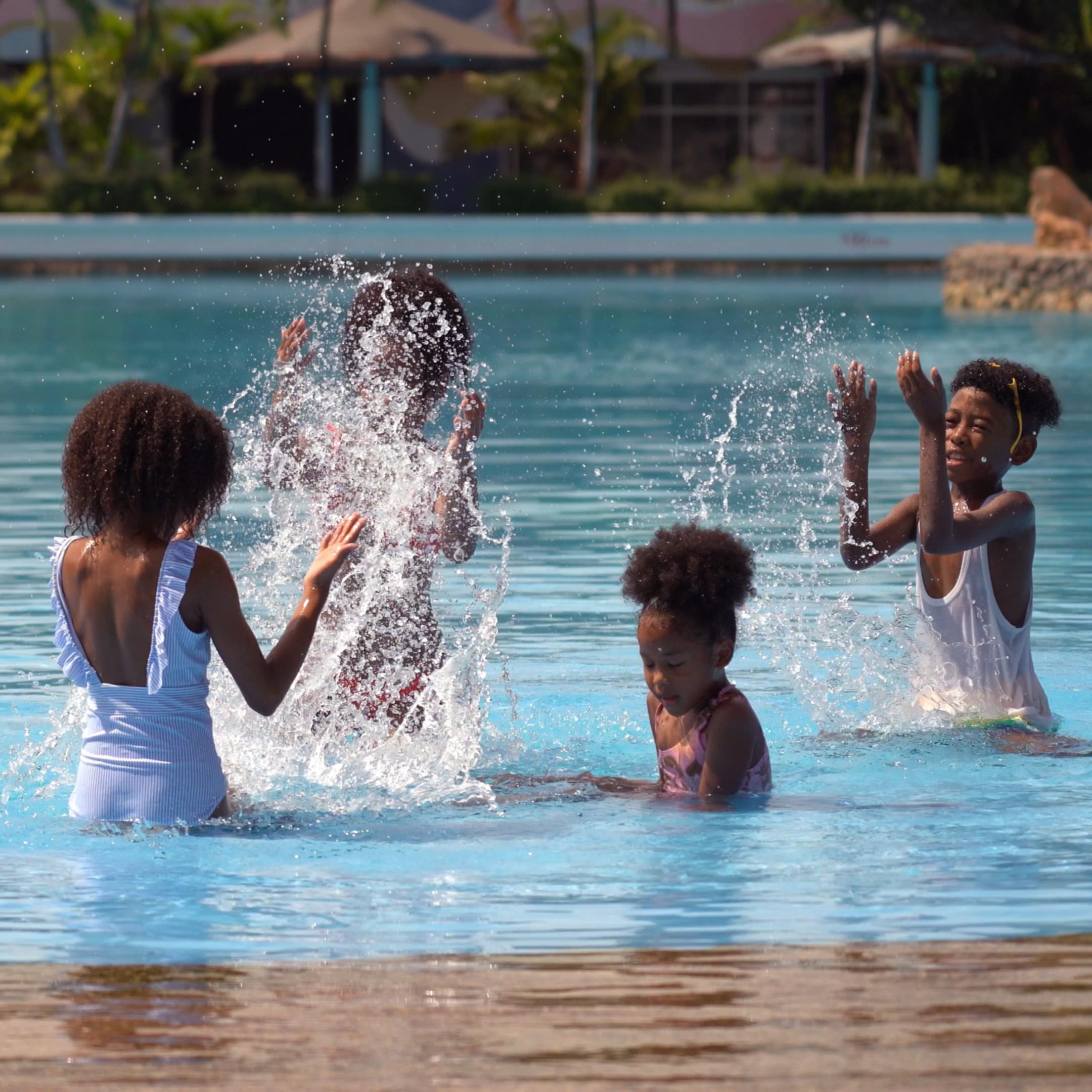 Children playing at water park