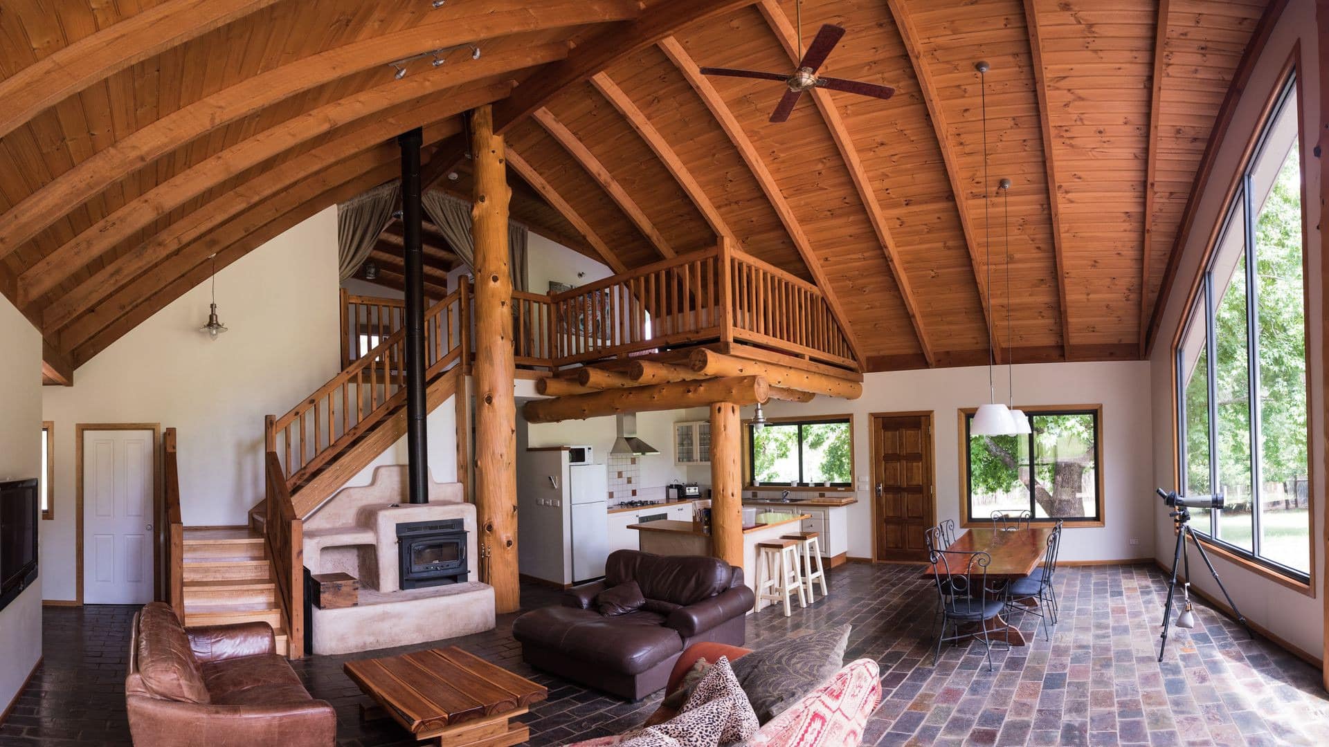 Drink in the outdoors in a Lake Pedder wilderness lodge