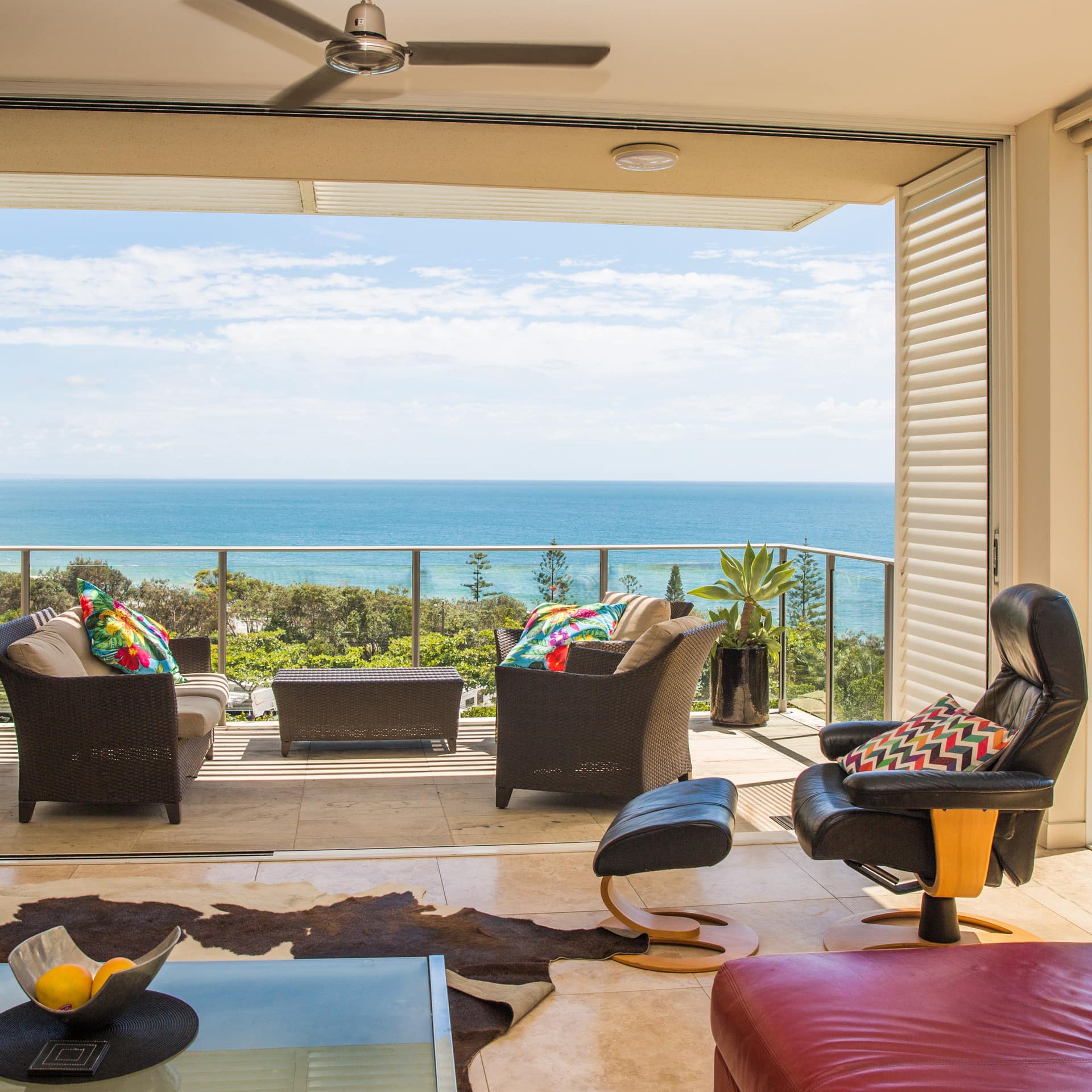 Uninterrupted view from living room and balcony of luxury apartment to the Pacific Ocean