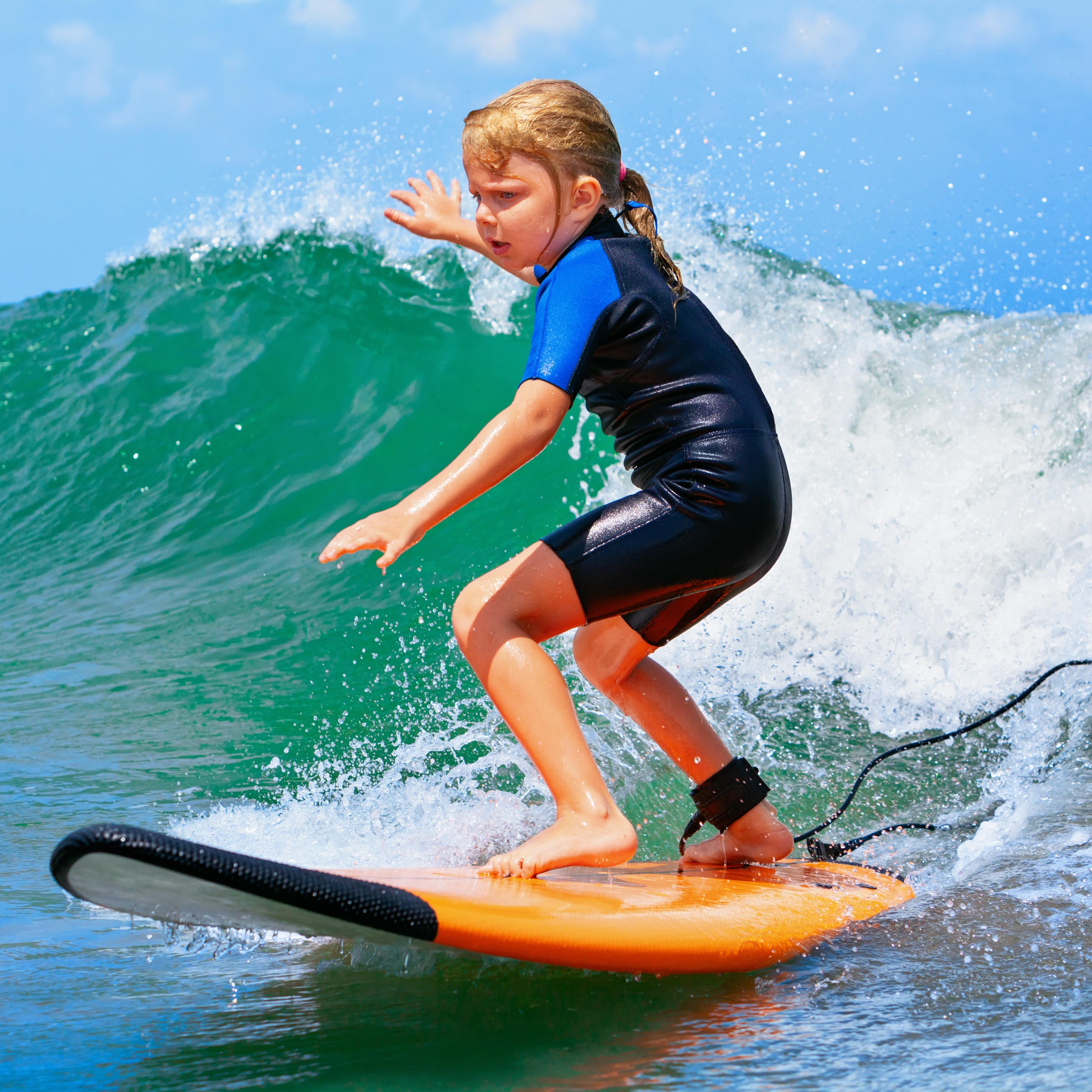 Little girl surfing