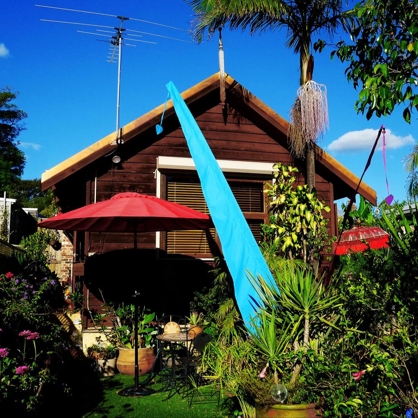 A Balinese-style studio retreat with lush tropical garden surroundings is perfect for a romantic getaway