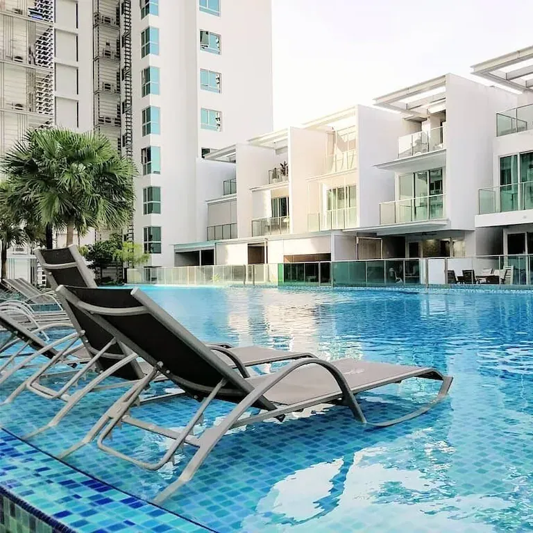 Chairs in the edge of the pool of suite rental