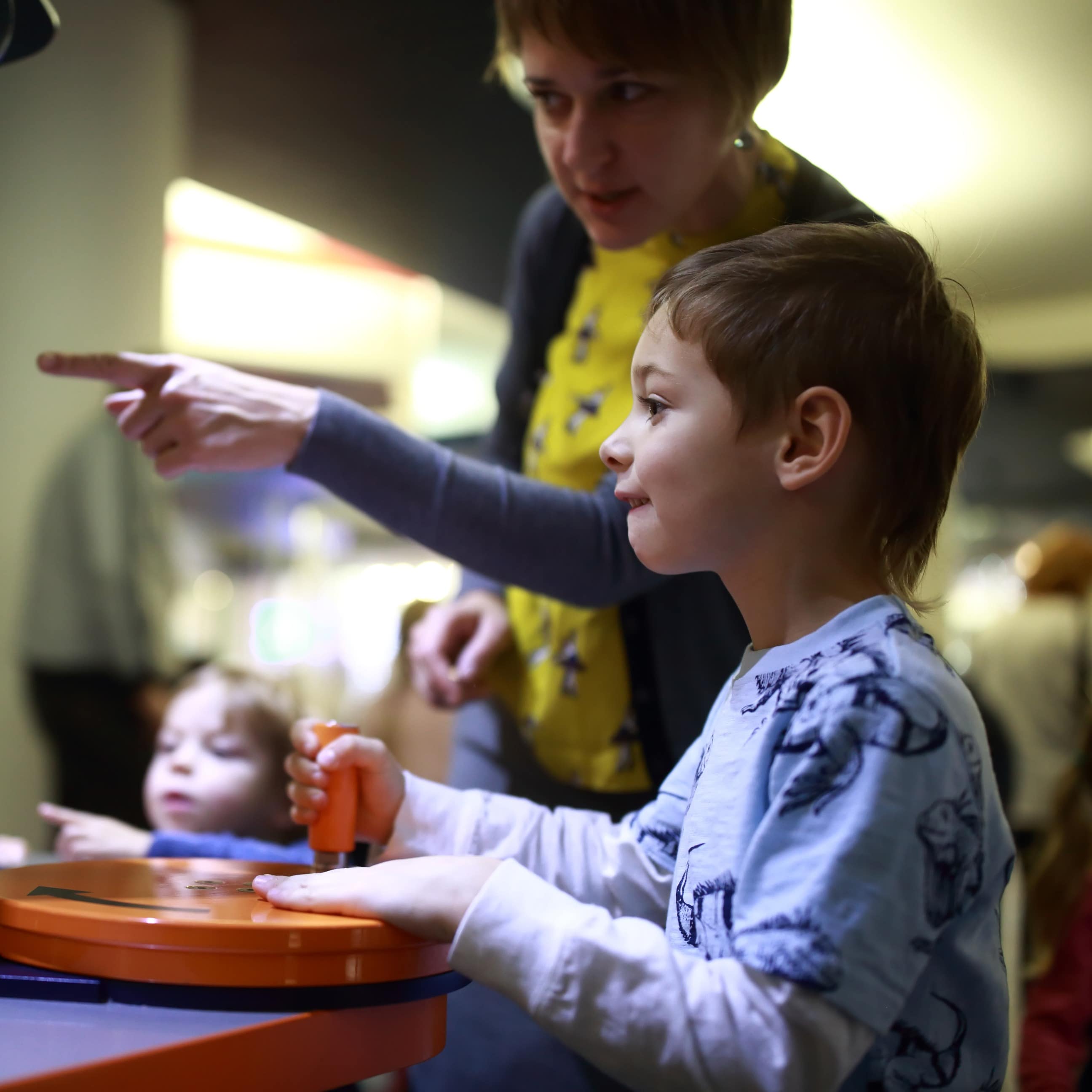 Mother and son at an interactive science exhibit