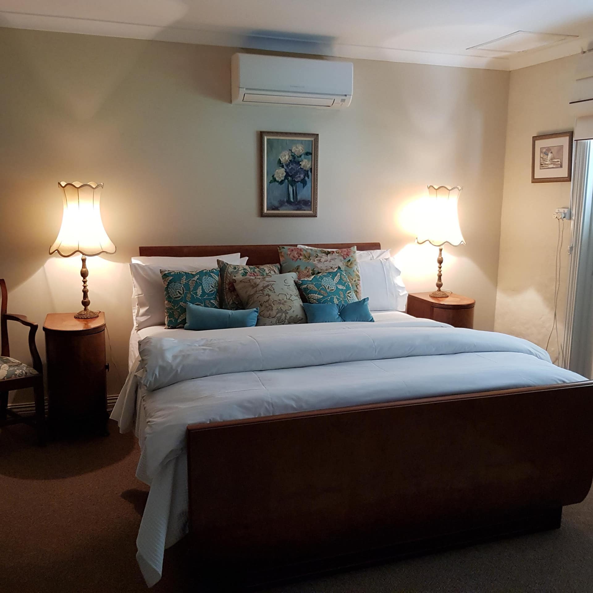 Bedroom in Albany bed and breakfast with a king size bed and two nightstands