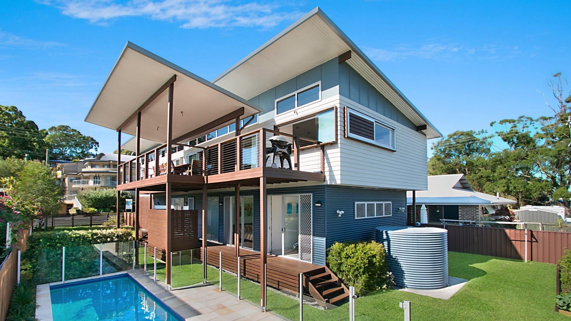 Ride the gnarly surf near a beach house in Coolangatta
