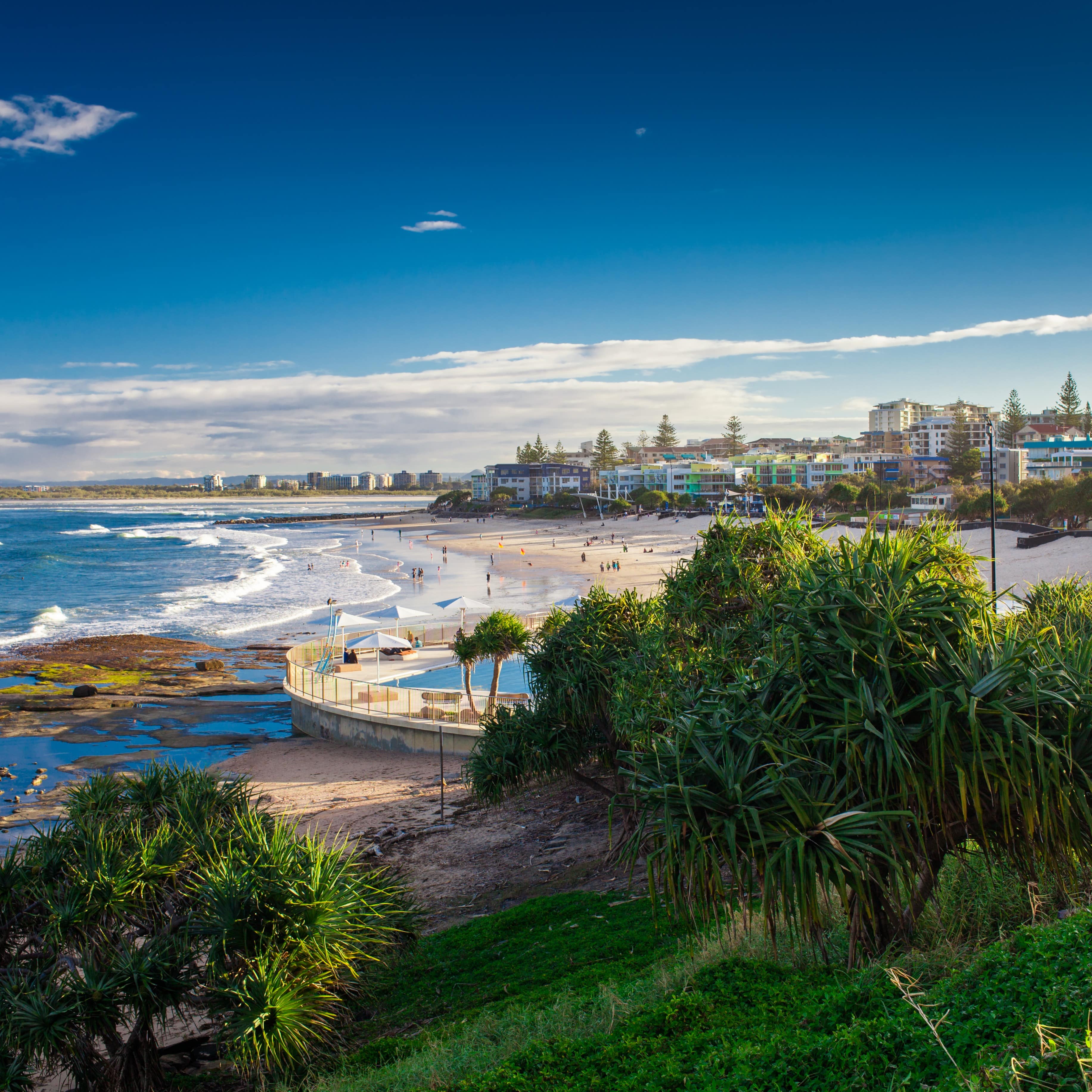 Sunny day at Kings Beach with pool, tide pools and ocean Calundra, Queensland, Australia