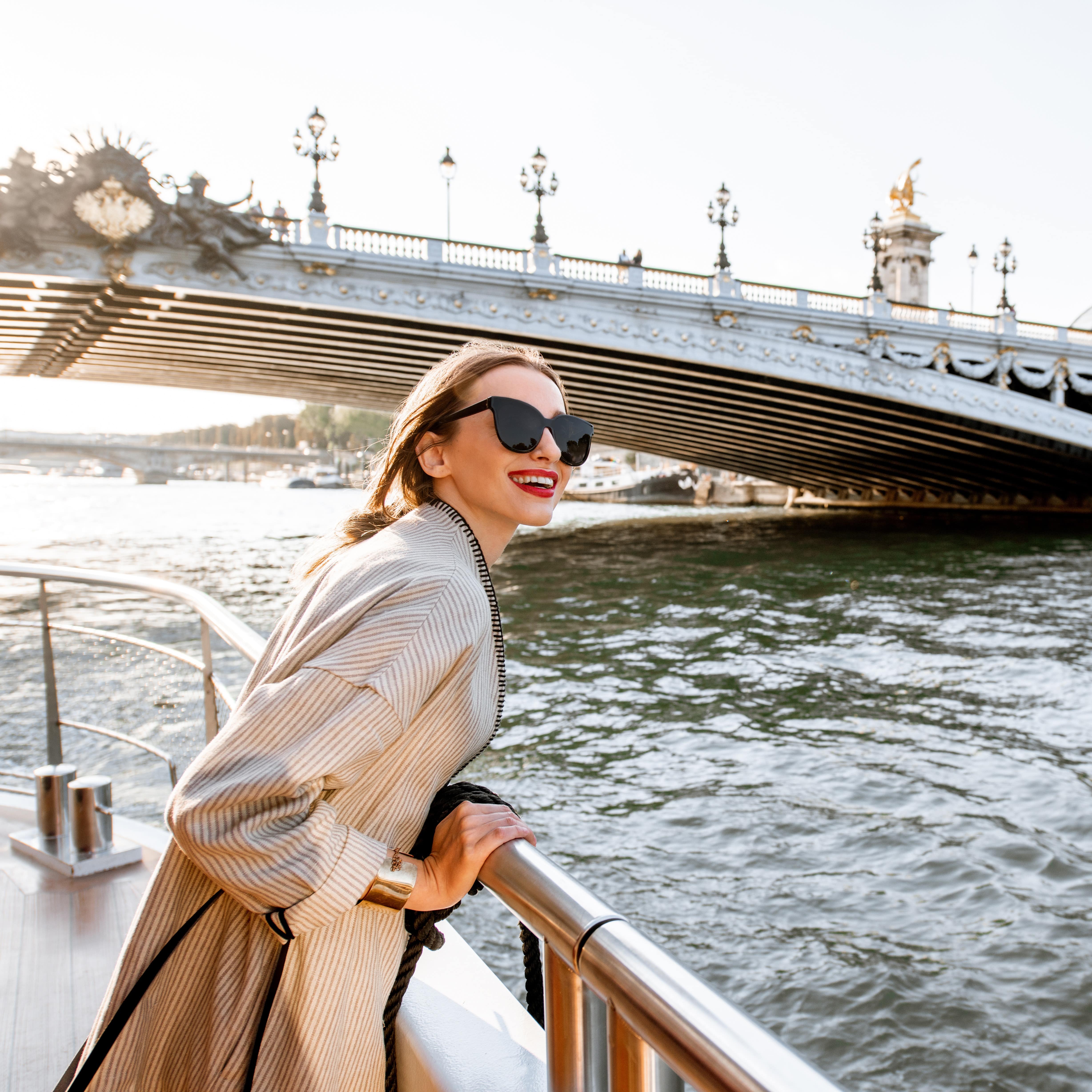 Young woman enjoying sightseeing cruise