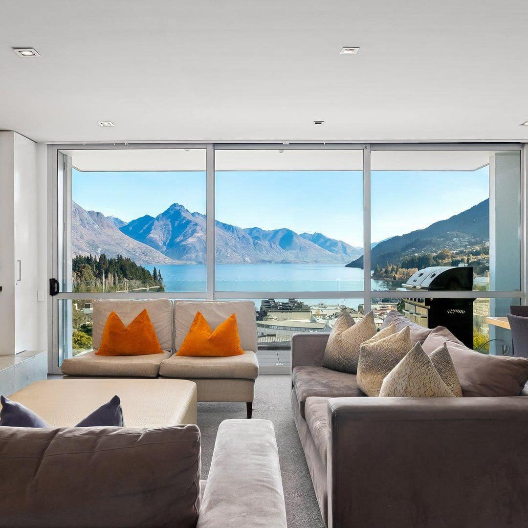 Contemporary furnished townhome with a windowed-wall looking out over Lake Wakatipu in Queenstown