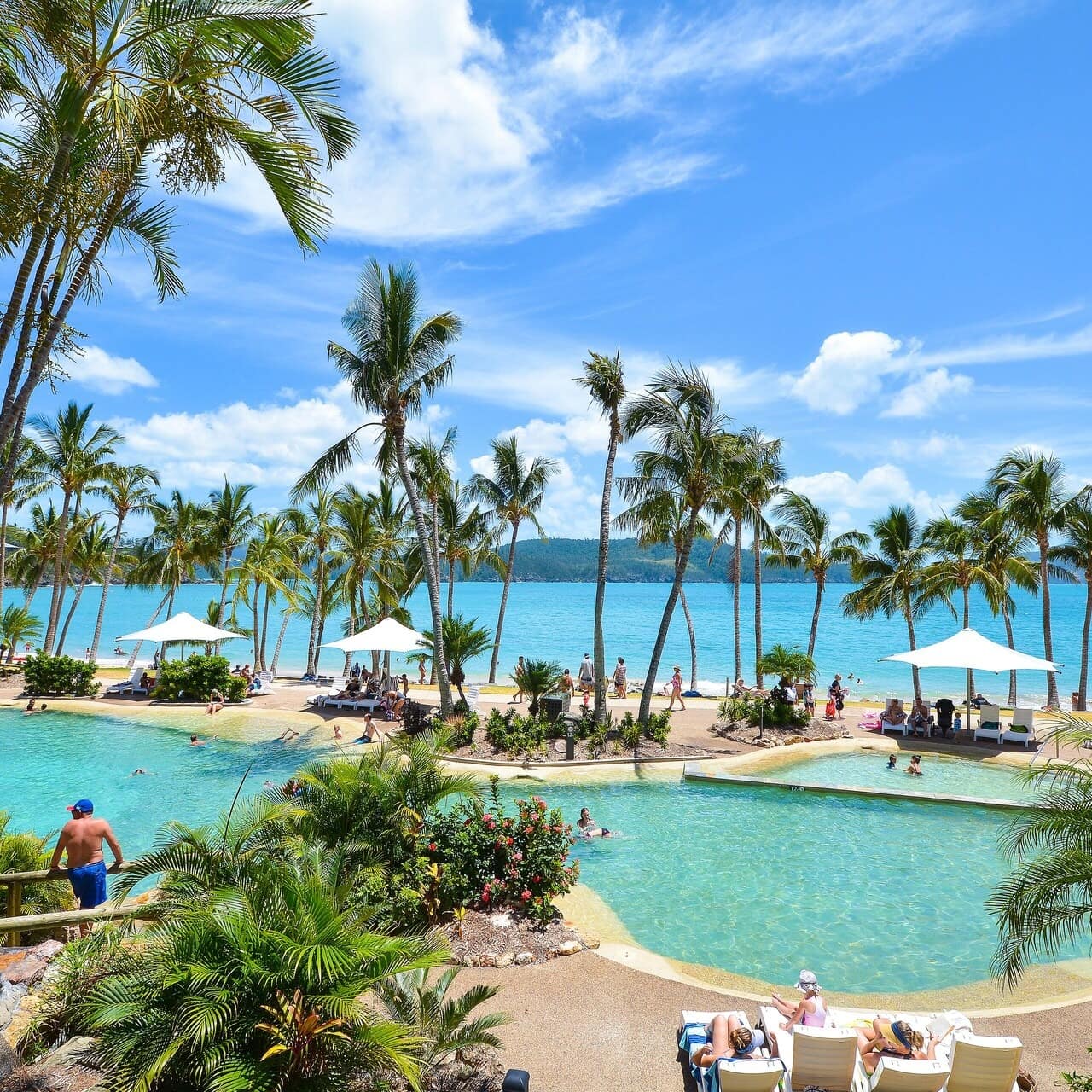 View of pool and beach from balcony