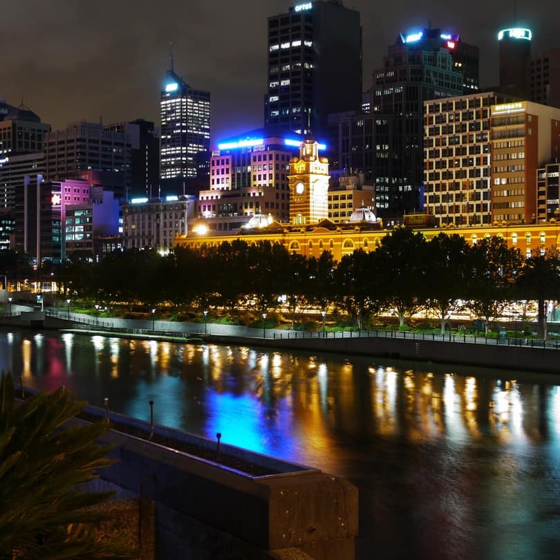 Night skyline of Melbourne with reflections of the city in the Yarra River