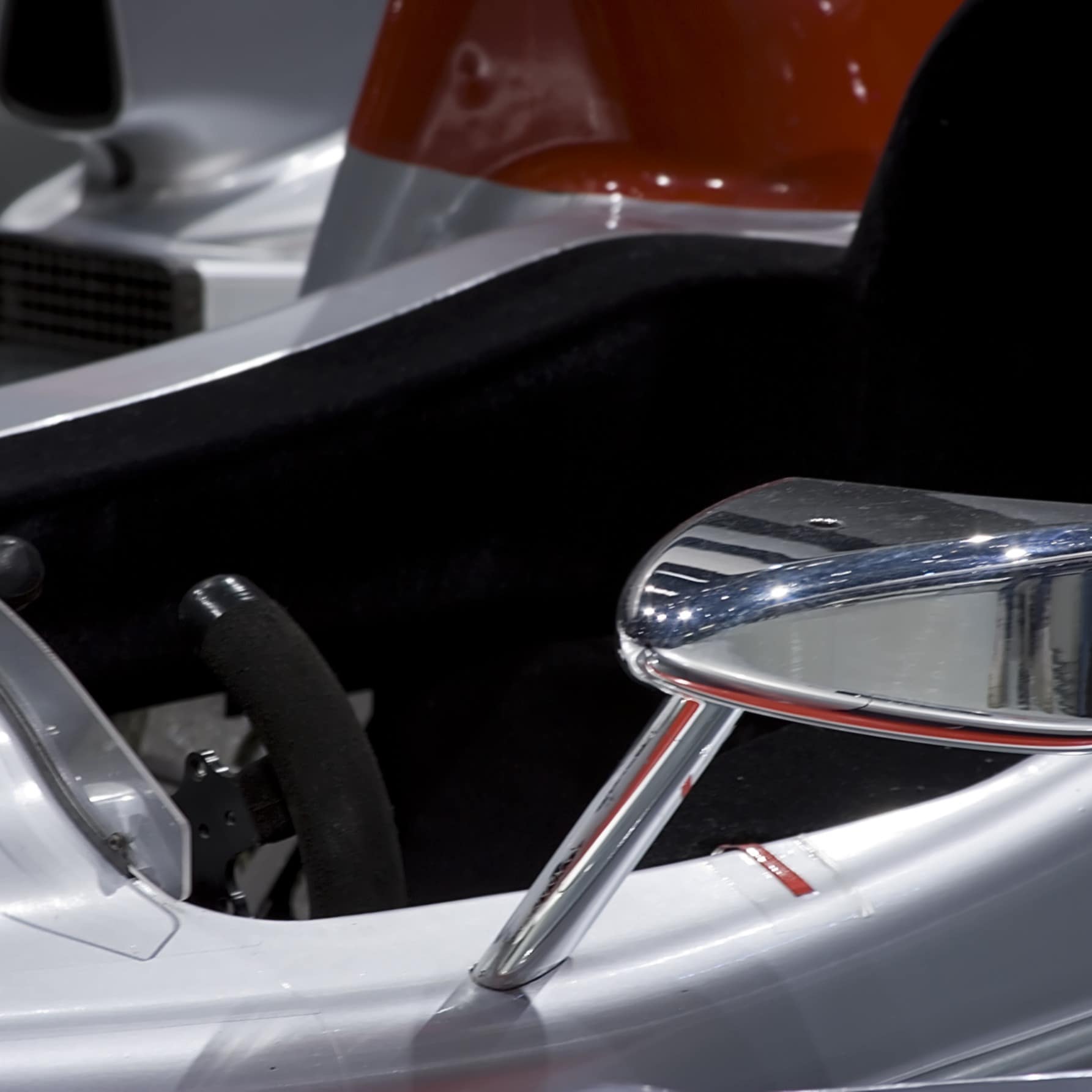 Close-up of open cart silver-gray race car