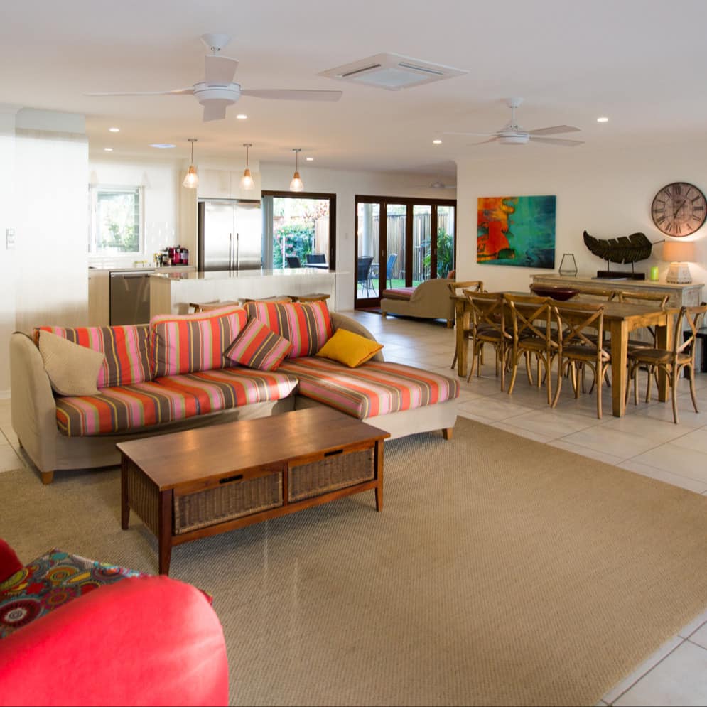Large open living room and dining room of family-friendly beach house