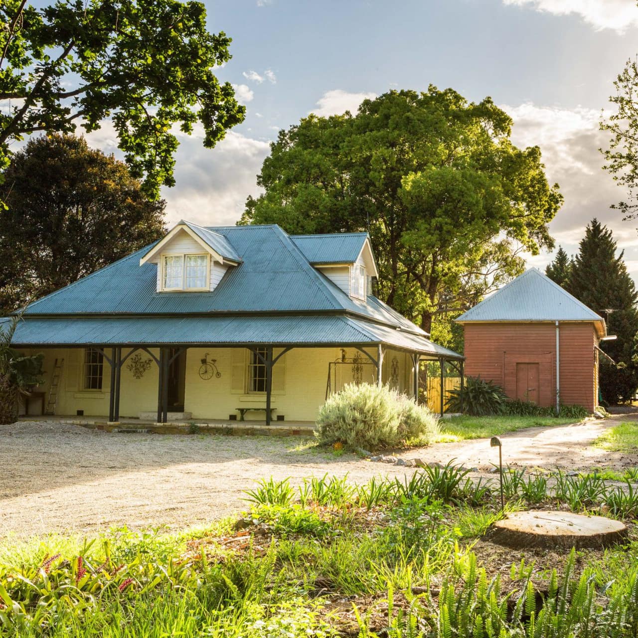 A classic and quaint schoolhouse and adjoining buildings in a historic and colourful setting