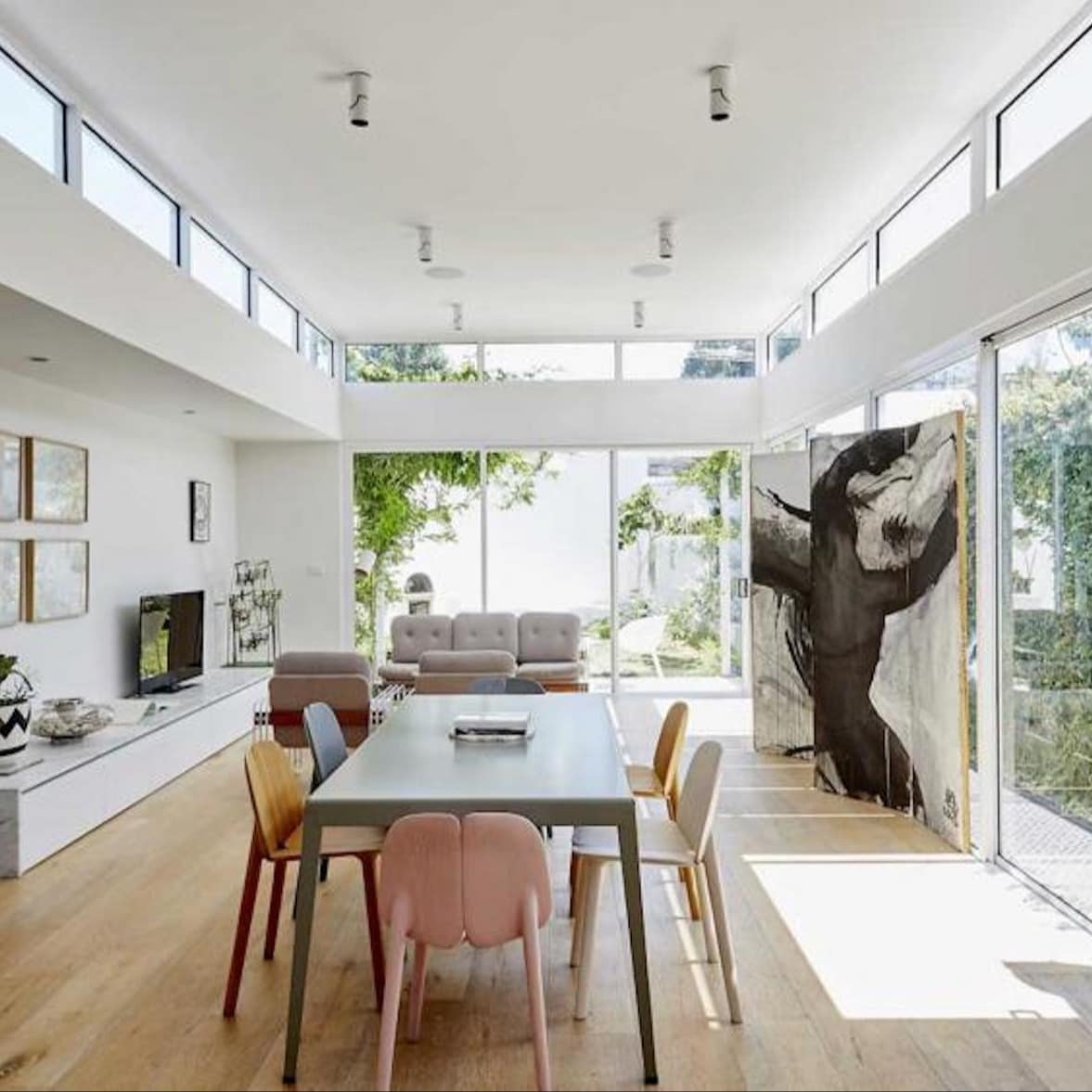 An ultra-modern apartment offers hardwood floors and plenty of natural light