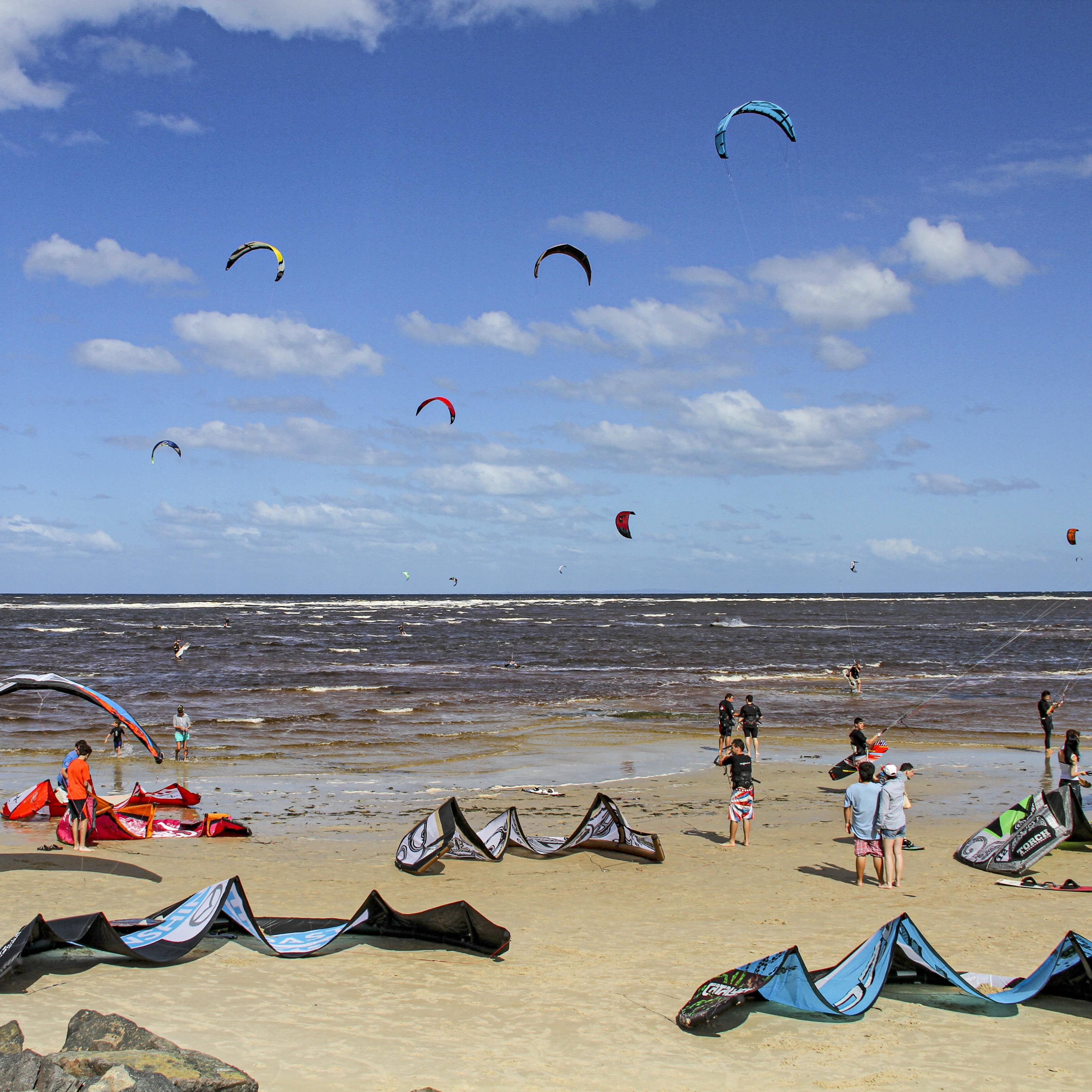 Kite surfing on beach in Caloundra