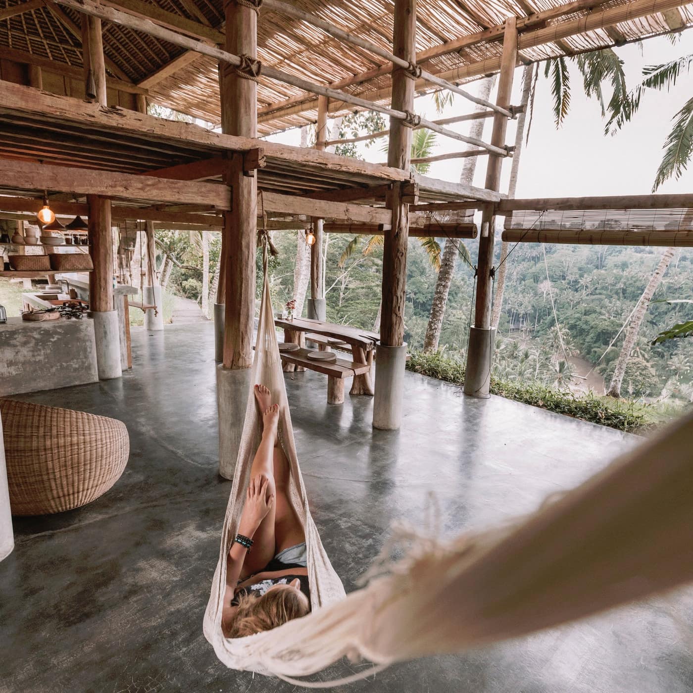 A treehouse with a hammock overlooking the palm jungles of Ubud, Indonesia
