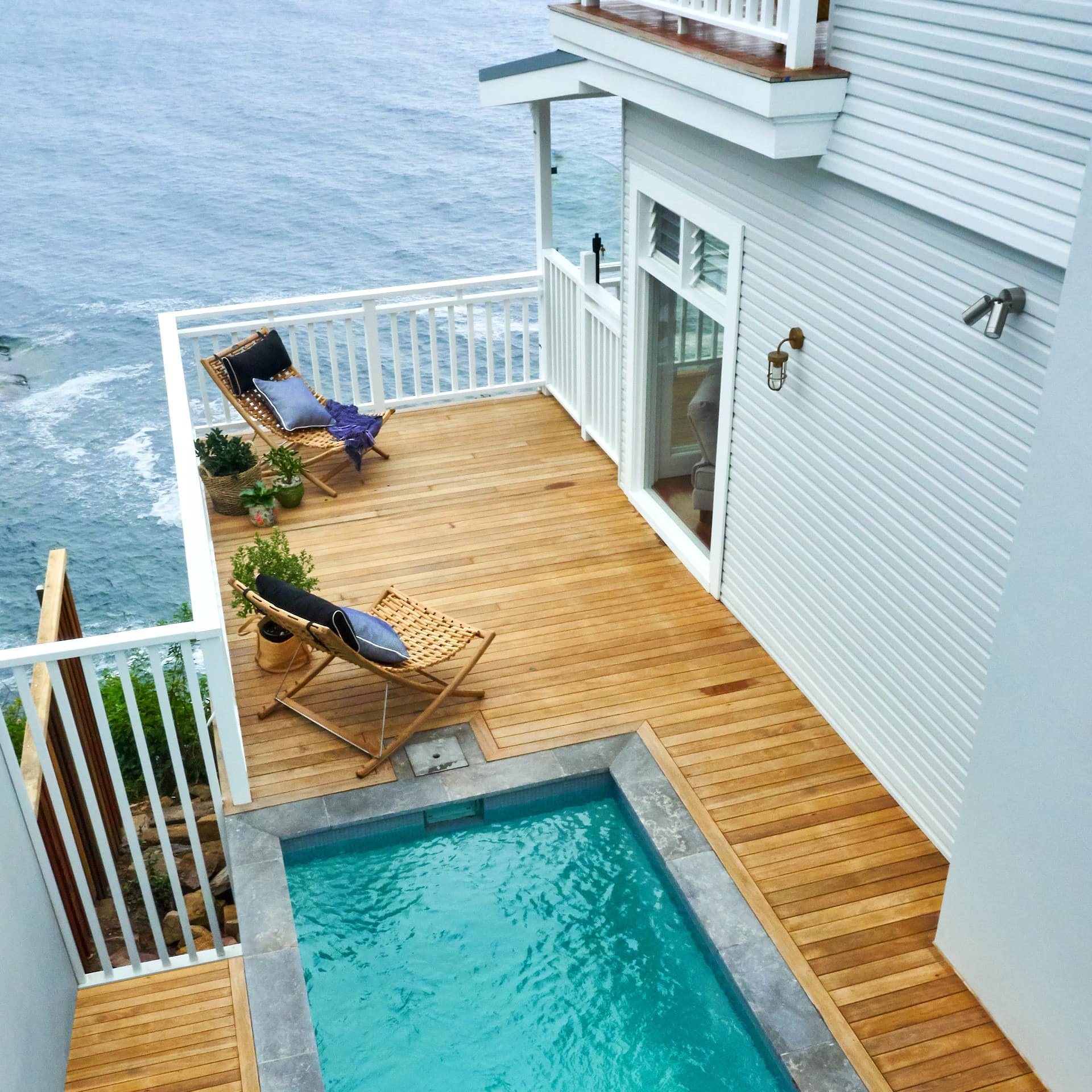 Exterior of luxury 4-bedroom house with pool overlooking the ocean